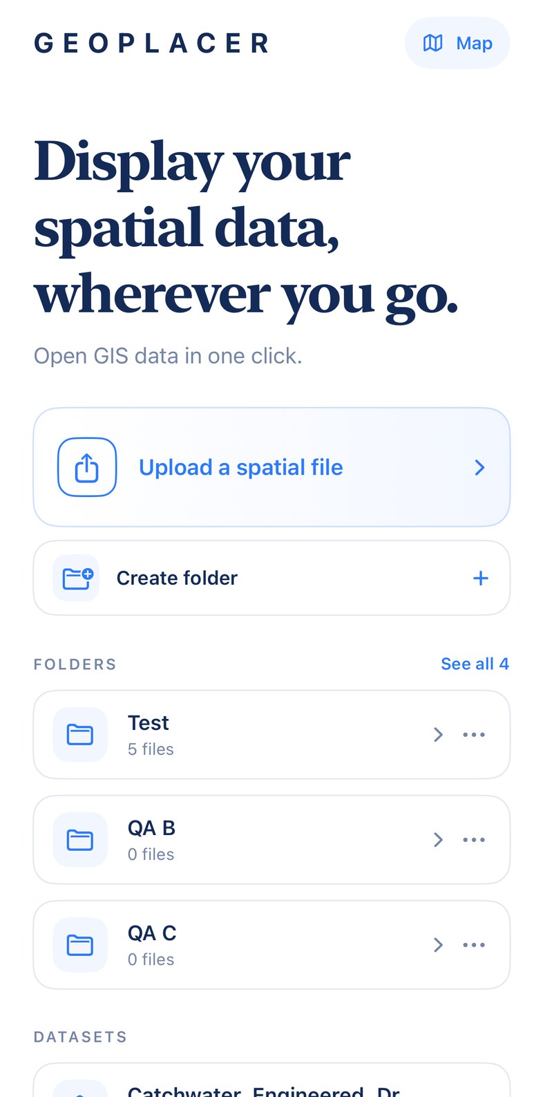 Geoplacer Home on iPhone, with Upload a spatial file, Create folder, Folders, and Map.